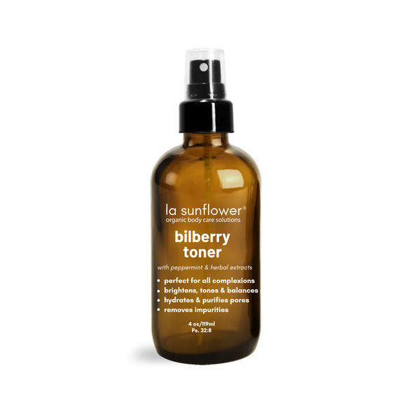 Brown bottle of la sunflower bilberry toner on a white background